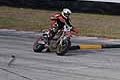 Bruno Marco su moto Honda che affronta la sci can prima del rettilino del circuito di Binetto